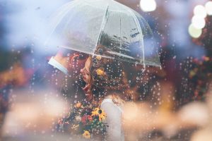 wedding couple in rain